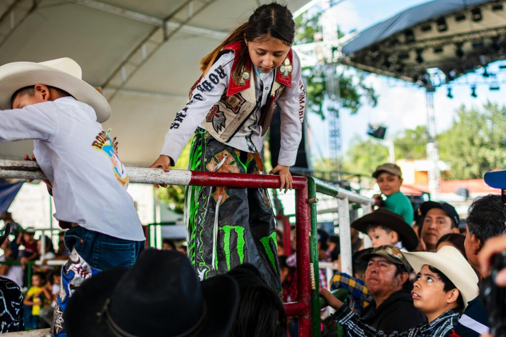 Kids participating in a traditional Mexican rodeo in Atotonilco el Grande, Hidalgo.